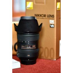 Nikon D7200 + Nikkor AF-S 18-200 mm + grip + filters